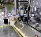 Used P.E. Labellers Six Head Rotary Labeler Model Master M With Dual Model M60 DX 150 Labelling Heads. Capable of Running Front and Back or Wraparound Pressure Sensitive Labels. Six (6) Bottle Plates...