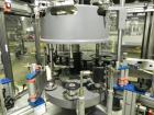 Used P.E. Labellers Six Head Rotary Labeler Model Master M With Dual Model M60 DX 150 Labelling Heads. Capable of Running Front and Back or Wraparound Pressure Sensitive Labels. Six (6) Bottle Plates...