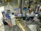 Used P.E. Labellers Six Head Rotary Labeler Model Master M With Dual Model M60 DX 150 Labelling Heads. Capable of Running Front and Back or Wraparound Pressure Sensitive Labels. Six (6) Bottle Plates...