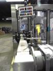 Used P.E. Labellers Six Head Rotary Labeler Model Master M With Dual Model M60 DX 150 Labelling Heads. Capable of Running Front and Back or Wraparound Pressure Sensitive Labels. Six (6) Bottle Plates...