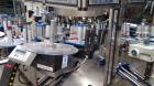 Used P.E. Labeler Non-Stop Front and Back Rotary Pressure Sensitive Labeler