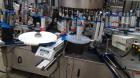 Used P.E. Labeler Non-Stop Front and Back Rotary Pressure Sensitive Labeler