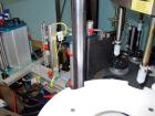 Used PE Master M Model MS12T77002S2E12 Head Pressure Sensitive Front and Back Rotary Labeler. Machine has clear label sensors and an Allen Bradley (AB) Panel View 600 control panel. Machine is equipp...
