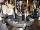 Used PE Master M Model MS12T77002S2E12 Head Pressure Sensitive Front and Back Rotary Labeler. Machine has clear label sensors and an Allen Bradley (AB) Panel View 600 control panel. Machine is equipp...