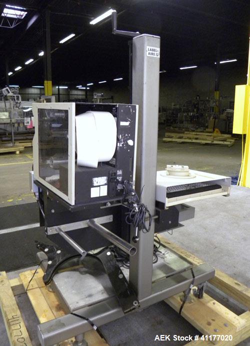 Used Label Aire 2111M/LH Print & Apply Labeler with Zebra print head. Model 2111 is a high speed air-blow labeling machine designed for very accurate label placement. The label is retained by vacuum ...