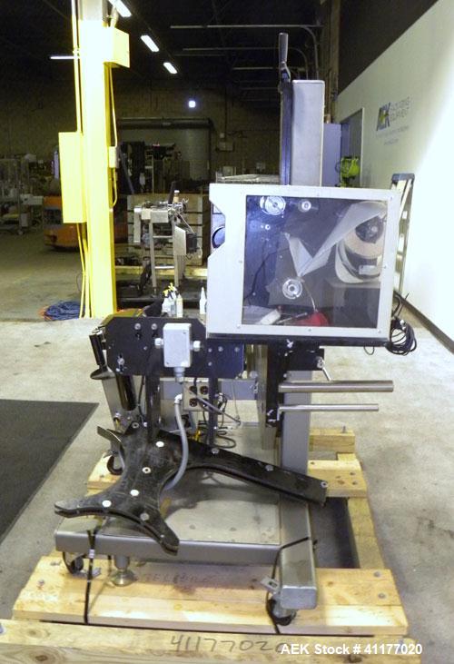 Used Label Aire 2111M/LH Print & Apply Labeler with Zebra print head. Model 2111 is a high speed air-blow labeling machine designed for very accurate label placement. The label is retained by vacuum ...