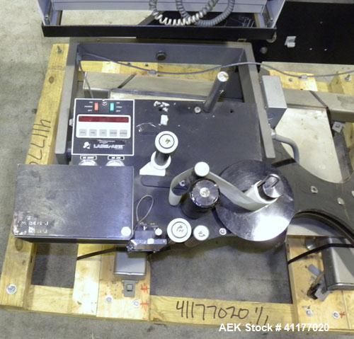 Used Label Aire 2111M/LH Print & Apply Labeler with Zebra print head. Model 2111 is a high speed air-blow labeling machine designed for very accurate label placement. The label is retained by vacuum ...