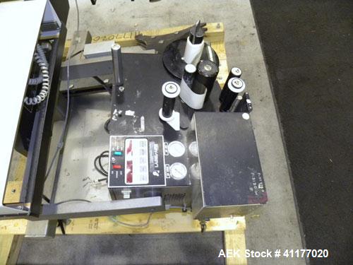 Used Label Aire 2111M/LH Print & Apply Labeler with Zebra print head. Model 2111 is a high speed air-blow labeling machine designed for very accurate label placement. The label is retained by vacuum ...