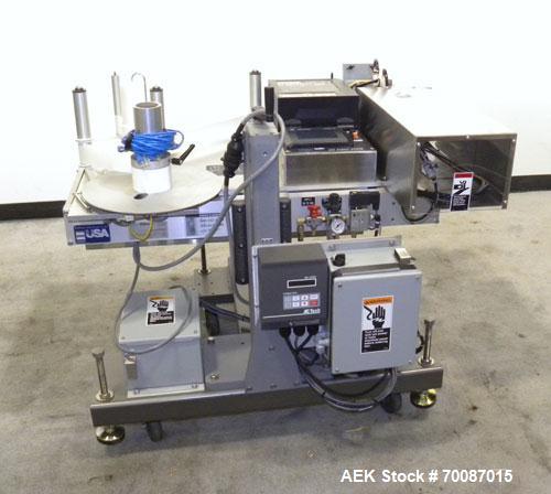 Used New Jersey Machine Print and Apply Labeler, Model 400R. Capable of 50 pieces per minute. Maximum label size 4" wide x 12" long, machine set up to do a corner wrap on a skid or box. This versatil...