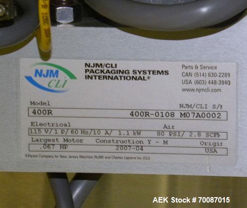 Used New Jersey Machine Print and Apply Labeler, Model 400R. Capable of 50 pieces per minute. Maximum label size 4" wide x 12" long, machine set up to do a corner wrap on a skid or box. This versatil...