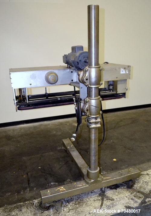 Used Side Belt Portable Transfer Conveyor. (2) Approximate 1” wide x 45” long side belts, manually adjustable to a maximum opening to 3-1/4”. Driven by a 1/4hp, 1/60/115/230 volt, 1725 rpm gear motor...