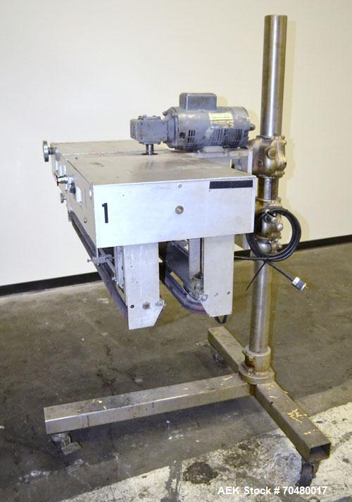Used Side Belt Portable Transfer Conveyor. (2) Approximate 1” wide x 45” long side belts, manually adjustable to a maximum opening to 3-1/4”. Driven by a 1/4hp, 1/60/115/230 volt, 1725 rpm gear motor...