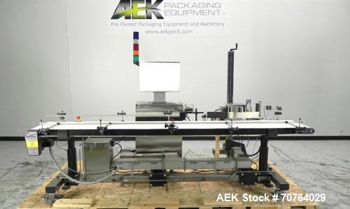 Used Paragon Model PLS-400 Print & Apply Case Labeler. Designed to print barcode and RFID labels. Machine has a 7” Tall label head. Includes automatic belt type case conveyor, integrated on common fr...