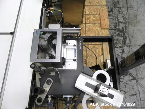 Used Paragon Model PLS-400 Print & Apply Case Labeler. Designed to print barcode and RFID labels. Machine has a 7” Tall label head. Includes automatic belt type case conveyor, integrated on common fr...