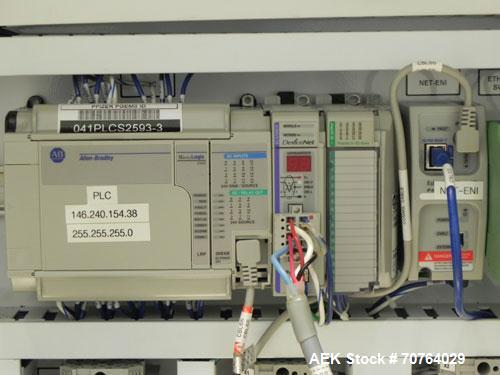 Used Paragon Model PLS-400 Print & Apply Case Labeler. Designed to print barcode and RFID labels. Machine has a 7” Tall label head. Includes automatic belt type case conveyor, integrated on common fr...