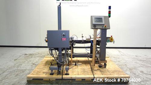 Used Paragon Model PLS-400 Print & Apply Case Labeler. Designed to print barcode and RFID labels using a Datamax DMX-A-4212 Print engine . Machine has a 7” Tall label head. Includes automatic belt ty...
