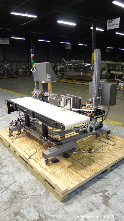 Used Paragon Model PLS-400 Print & Apply Case Labeler. Designed to print barcode and RFID labels using a Datamax DMX-A-4212 Print engine . Machine has a 7” Tall label head. Includes automatic belt ty...