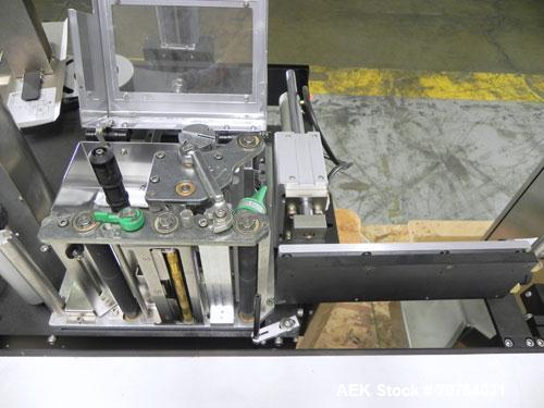 Used Paragon Model PLS-400 Print & Apply Case Labeler. Designed to print barcode and RFID labels. Machine has a 7” Tall label head. Includes automatic belt type case conveyor, integrated on common fr...