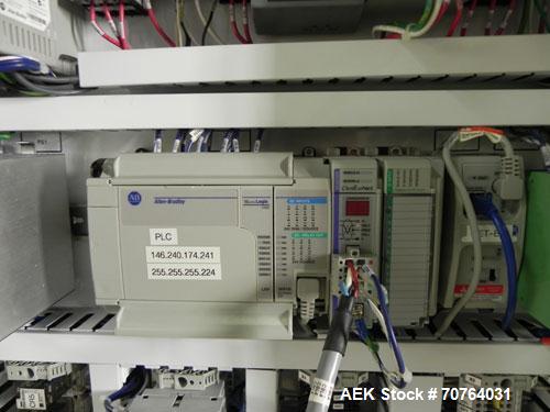 Used Paragon Model PLS-400 Print & Apply Case Labeler. Designed to print barcode and RFID labels. Machine has a 7” Tall label head. Includes automatic belt type case conveyor, integrated on common fr...