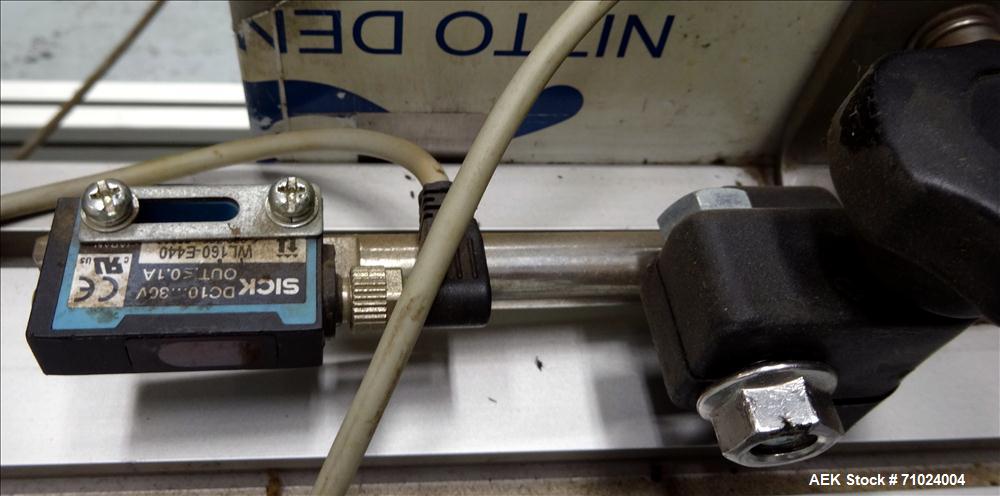 Used Tronics Model S1000 Stand Alone Pressure Sensitive Labeler. Capable of speeds up 1,200" per minute. Has maximum label height of 8.5". Equipped with 9.5" peel plate, tronics hmi, and label sensor...