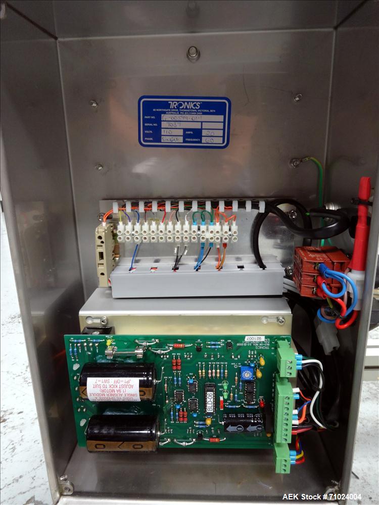 Used Tronics Model S1000 Stand Alone Pressure Sensitive Labeler. Capable of speeds up 1,200" per minute. Has maximum label height of 8.5". Equipped with 9.5" peel plate, tronics hmi, and label sensor...