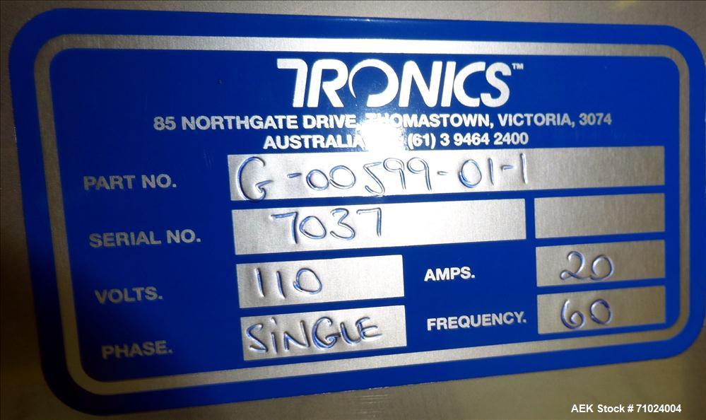 Used Tronics Model S1000 Stand Alone Pressure Sensitive Labeler. Capable of speeds up 1,200" per minute. Has maximum label height of 8.5". Equipped with 9.5" peel plate, tronics hmi, and label sensor...