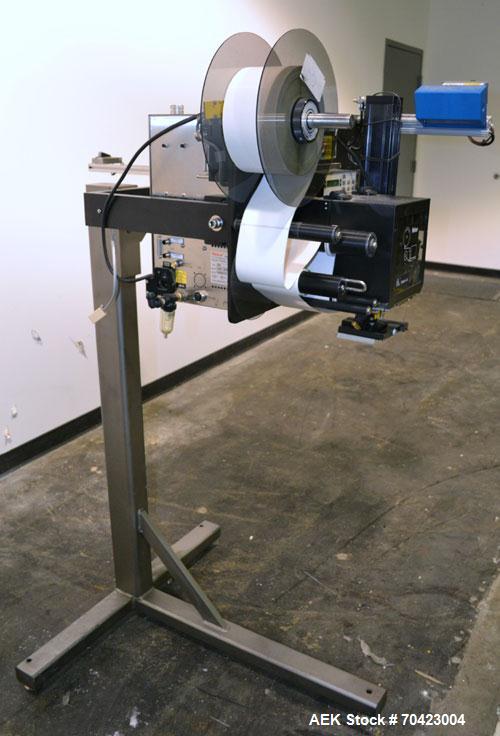 Used Weber Marking Systems Series 5200 Label Printer Applicator Model 5200V2. Label roll size maximum 12" diameter. Includes a Zebra 170 PAX4 print engine. 1/60/115 volt, 5 amp. Mounted on a frame.