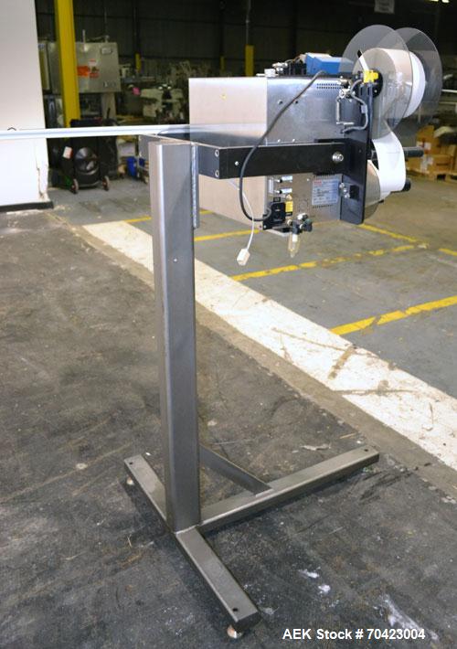 Used Weber Marking Systems Series 5200 Label Printer Applicator Model 5200V2. Label roll size maximum 12" diameter. Includes a Zebra 170 PAX4 print engine. 1/60/115 volt, 5 amp. Mounted on a frame.