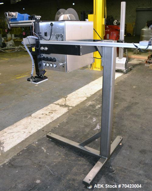 Used Weber Marking Systems Series 5200 Label Printer Applicator Model 5200V2. Label roll size maximum 12" diameter. Includes a Zebra 170 PAX4 print engine. 1/60/115 volt, 5 amp. Mounted on a frame.