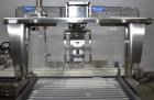 Used Domino M-Series Print & Apply Labeler with Optel OP300-A Inspection System