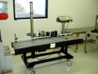 Used Auto Labe Pail Labeler, Model 844, with belt conveyor, serial #971092.