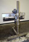 Used Side Belt Portable Transfer Conveyor. (2) Approximate 1” wide x 45” long side belts, manually adjustable to a maximum opening to 3-1/4”. Driven by a 1/4hp, 1/60/115/230 volt, 1725 rpm gear motor...