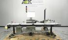 Used Paragon Model PLS-400 Print & Apply Case Labeler. Designed to print barcode and RFID labels. Machine has a 7” Tall label head. Includes automatic belt type case conveyor, integrated on common fr...