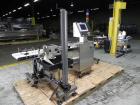 Used Paragon Model PLS-400 Print & Apply Case Labeler. Designed to print barcode and RFID labels. Machine has a 7” Tall label head. Includes automatic belt type case conveyor, integrated on common fr...
