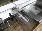 Used Paragon Model PLS-400 Print & Apply Case Labeler. Designed to print barcode and RFID labels. Machine has a 7” Tall label head. Includes automatic belt type case conveyor, integrated on common fr...