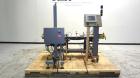 Used Paragon Model PLS-400 Print & Apply Case Labeler. Designed to print barcode and RFID labels using a Datamax DMX-A-4212 Print engine . Machine has a 7” Tall label head. Includes automatic belt ty...