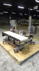 Used Paragon Model PLS-400 Print & Apply Case Labeler. Designed to print barcode and RFID labels using a Datamax DMX-A-4212 Print engine . Machine has a 7” Tall label head. Includes automatic belt ty...