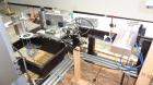 Used Paragon Model PLS-400 Print & Apply Case Labeler. Designed to print barcode and RFID labels using a Datamax DMX-A-4212 Print engine . Machine has a 7” Tall label head. Includes automatic belt ty...