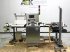 Used Paragon Model PLS-400 Print & Apply Case Labeler. Designed to print barcode and RFID labels. Machine has a 7” Tall label head. Includes automatic belt type case conveyor, integrated on common fr...