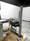 Used Paragon Model PLS-400 Print & Apply Case Labeler. Designed to print barcode and RFID labels. Machine has a 7” Tall label head. Includes automatic belt type case conveyor, integrated on common fr...