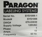 Used Paragon Model PLS-400 Print & Apply Case Labeler. Designed to print barcode and RFID labels. Machine has a 7” Tall label head. Includes automatic belt type case conveyor, integrated on common fr...