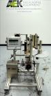 Used Tronics Model S1000 Stand Alone Pressure Sensitive Labeler. Capable of speeds up 1,200
