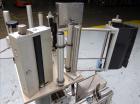 Used Tronics Model S1000 Stand Alone Pressure Sensitive Labeler. Capable of speeds up 1,200
