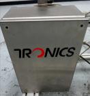 Used Tronics Model S1000 Stand Alone Pressure Sensitive Labeler. Capable of speeds up 1,200