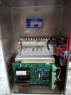 Used Tronics Model S1000 Stand Alone Pressure Sensitive Labeler. Capable of speeds up 1,200
