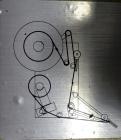 Used Tronics Model S1000 Stand Alone Pressure Sensitive Labeler. Capable of speeds up 1,200