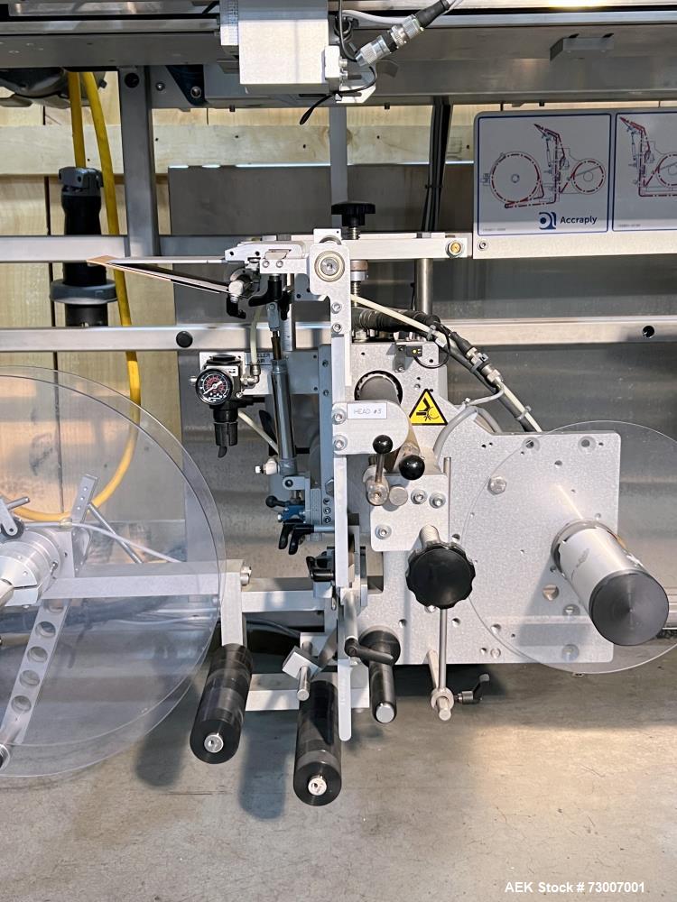 Used Accraply Model 350B-S Series Top and Bottom Labeling System. Capable of up to 120 products per minute depending on application. Special purpose labeling system developed specifically to apply to...