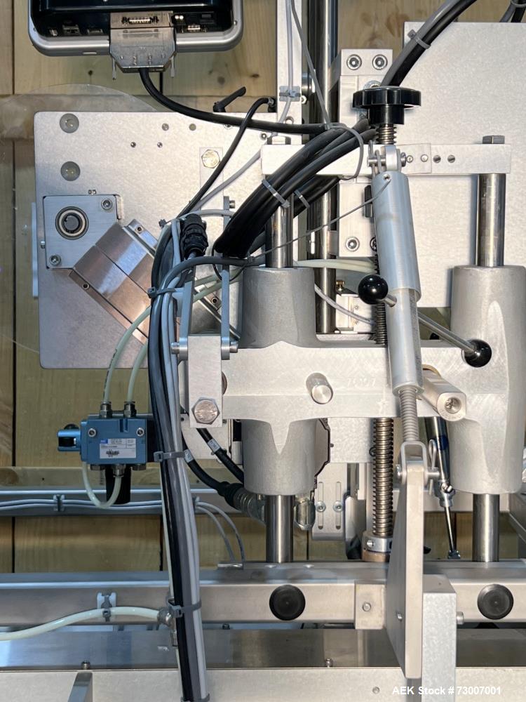 Used Accraply Model 350B-S Series Top and Bottom Labeling System. Capable of up to 120 products per minute depending on application. Special purpose labeling system developed specifically to apply to...
