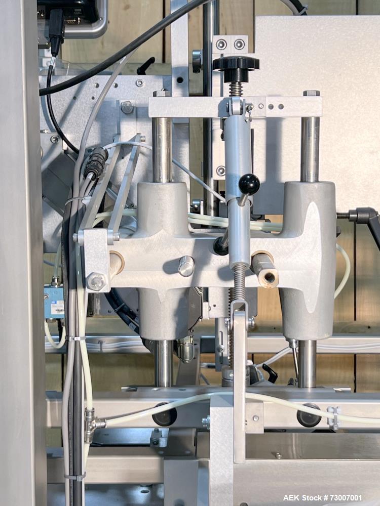 Used Accraply Model 350B-S Series Top and Bottom Labeling System. Capable of up to 120 products per minute depending on application. Special purpose labeling system developed specifically to apply to...
