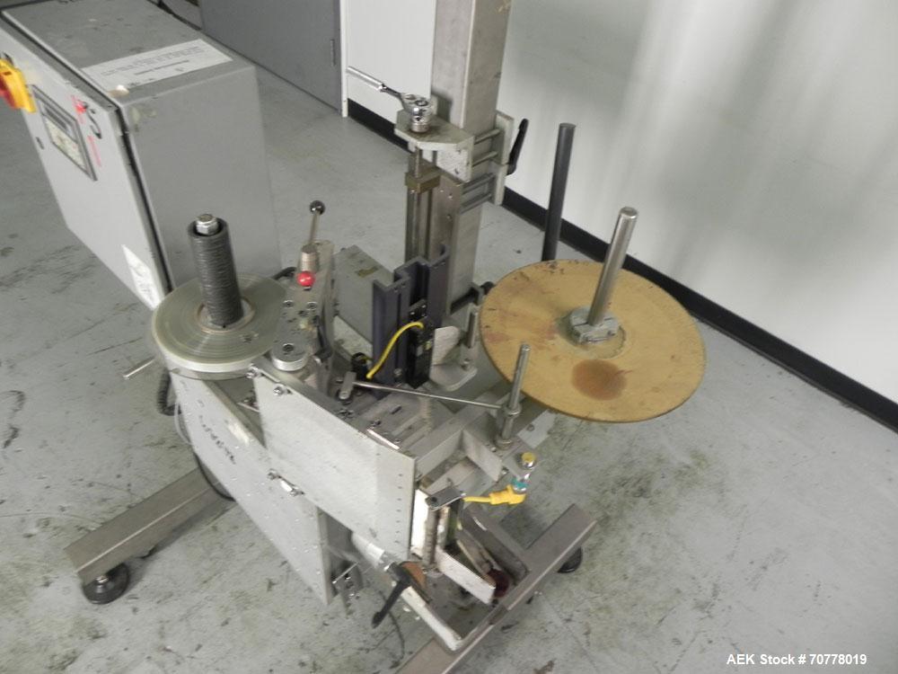 Used Accraply Model 350 Pedestal Mounted Pressure Sensitive Labeler. Last used in cosmetic operation.